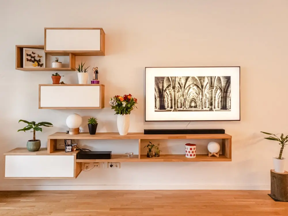 Custom floating shelves and wall storage millwork