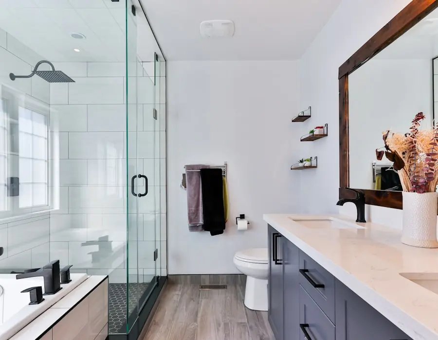 Custom double bathroom vanity with a stone top and black hardware